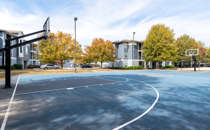 the mill at auburn off campus apartments near auburn university community amenities lighted full size basketball court