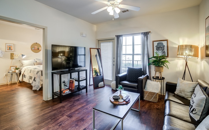 the mill at auburn off campus apartments near auburn university fully furnished apartments hardwood flooring 55 inch smart tv in living room renovated floor plans